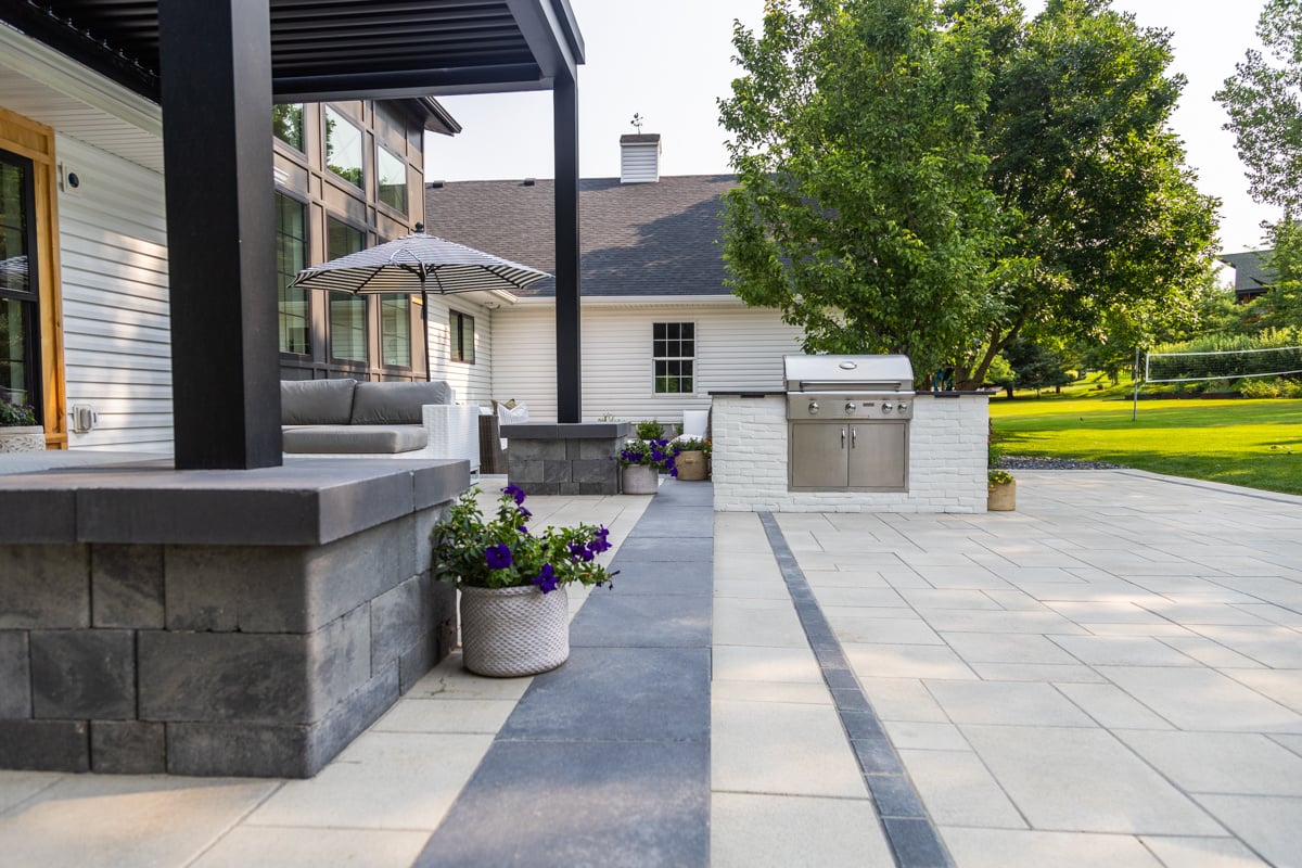 patio pergola door entrance seating annuals outdoor kitchen