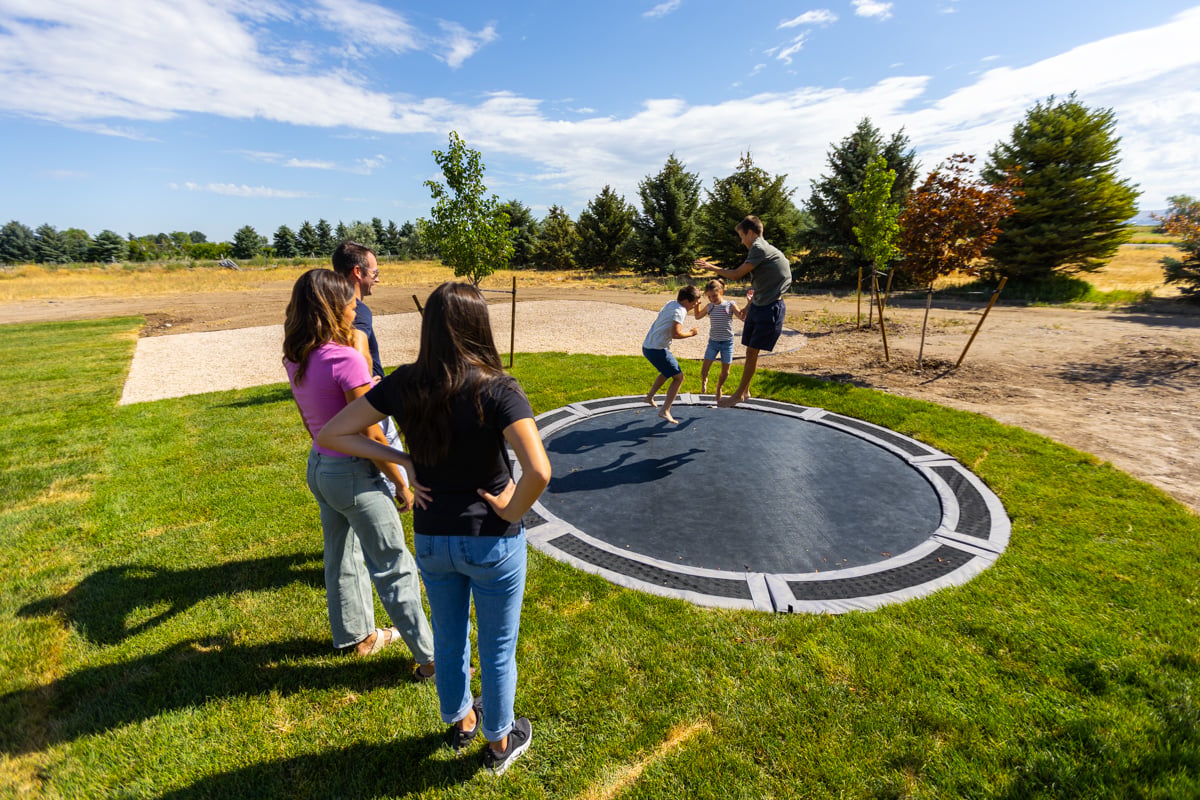 customer account manager designer inspection meeting design build installation site walk kids playing 6