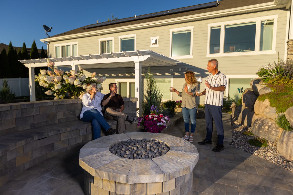 customers family patio planting grasses fire pit sitting wall hardscape 2