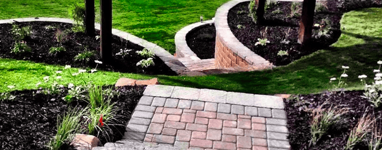 Adding an aesthetically pleasing retaining wall is one landscape design trend in Idaho Falls.