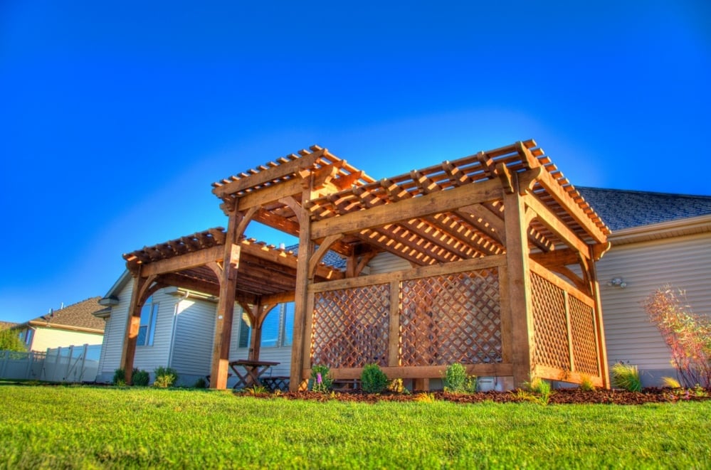 wood pergola in backyard