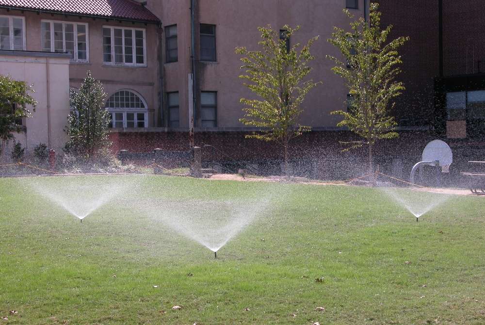 lawn sprinklers spraying