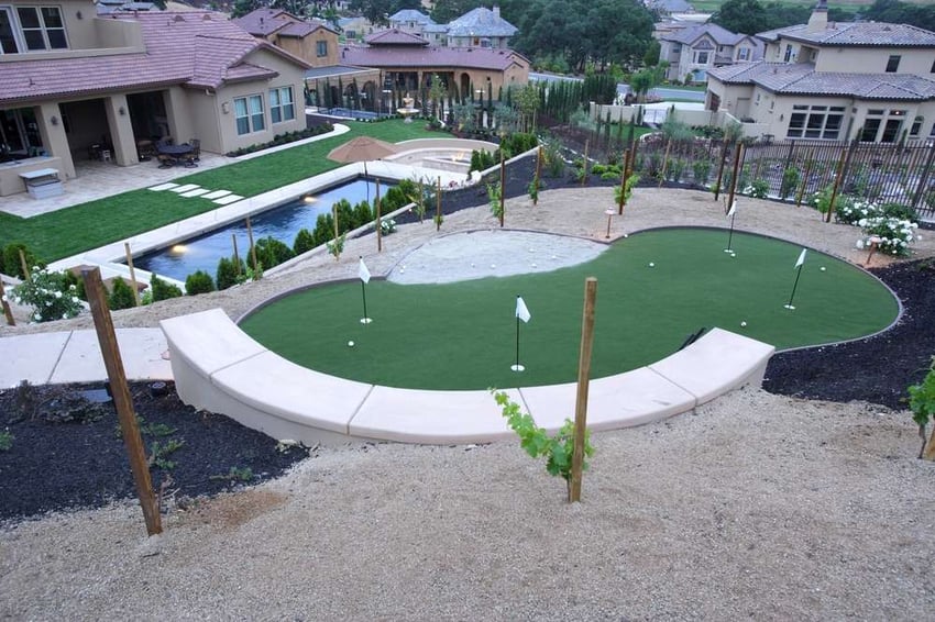 modern landscape design with pool and mini golf