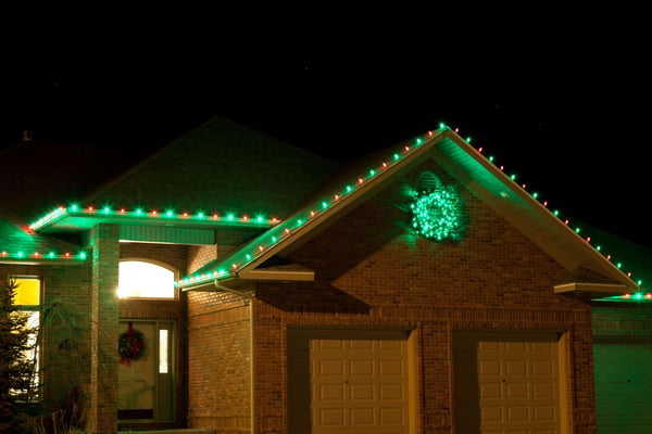 House with simple holiday lighting