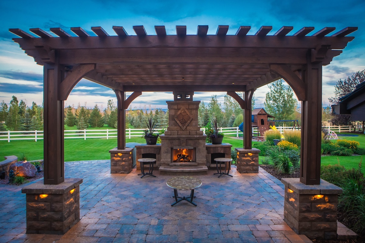 patio with fireplace and pergola