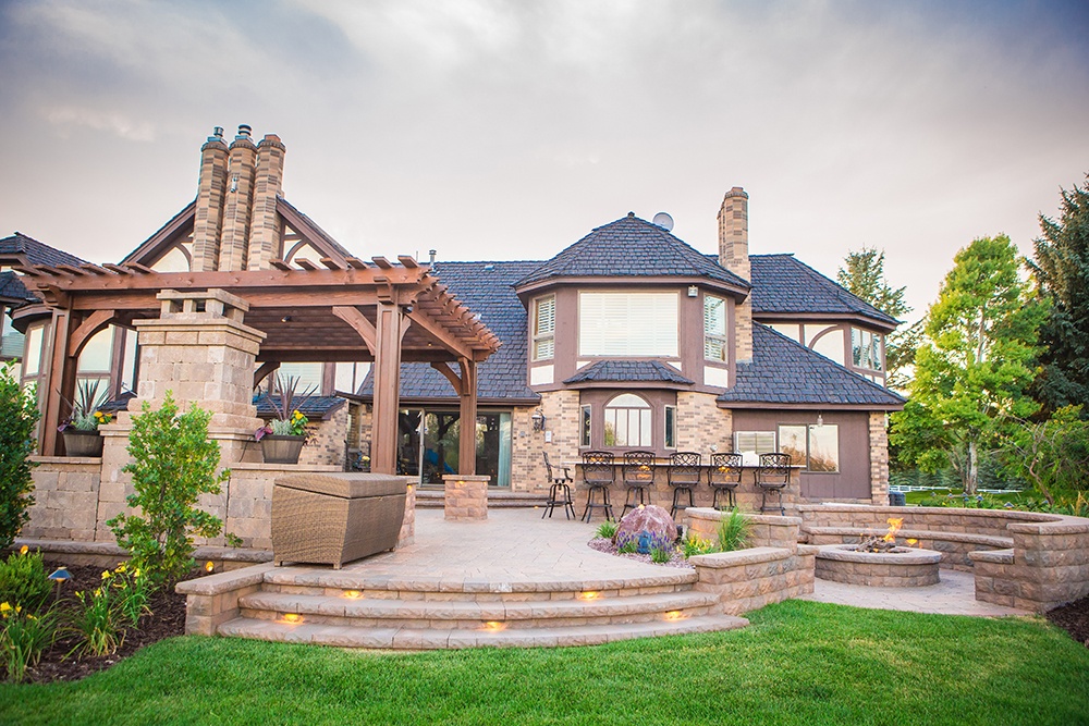 landscape design with fire pit and fireplace on patio