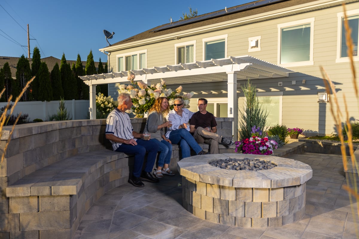 customers family patio planting grasses fire pit sitting wall hardscape pergola 2