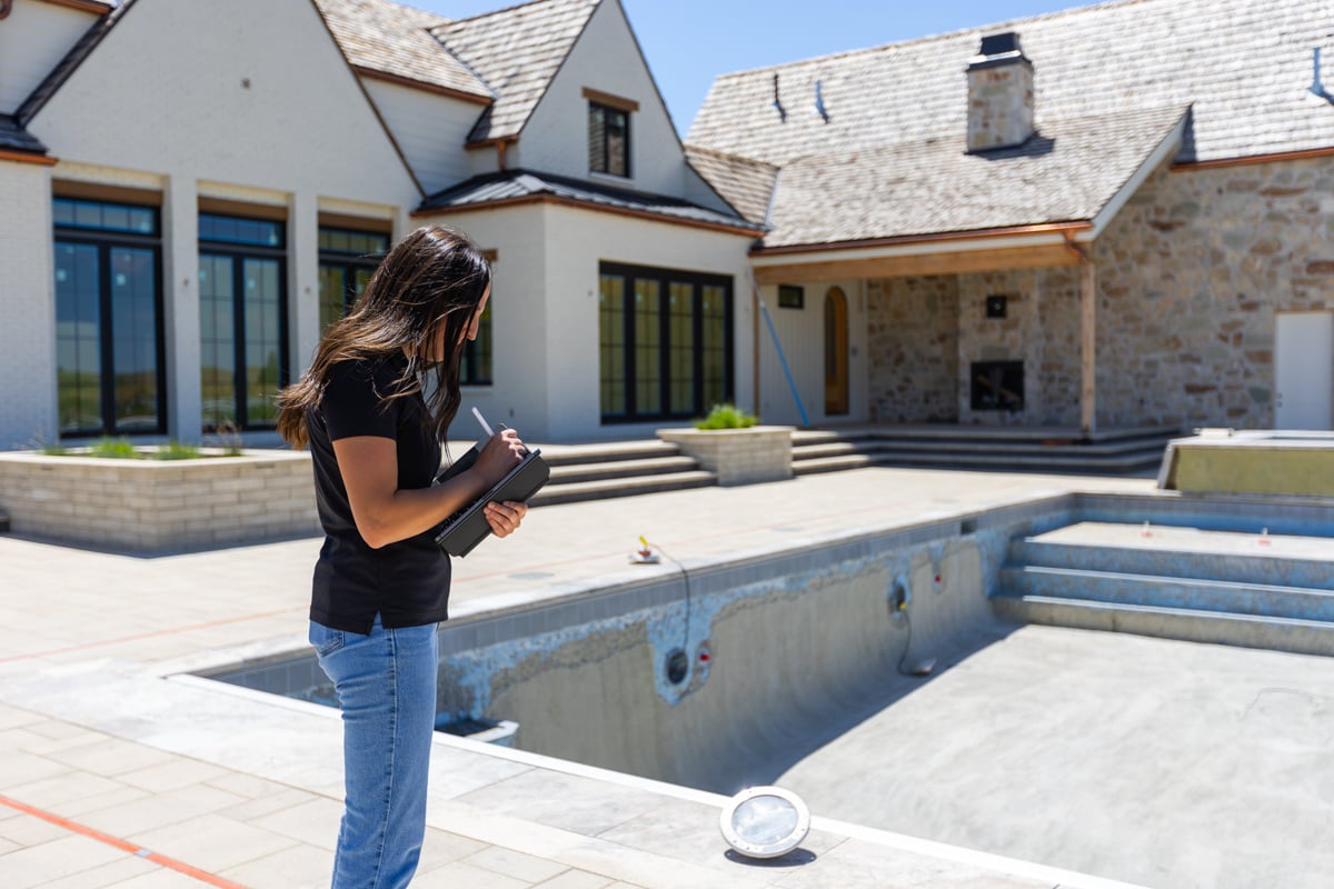 designer account manager inspection walkthrough backyard pool patio pavers 5