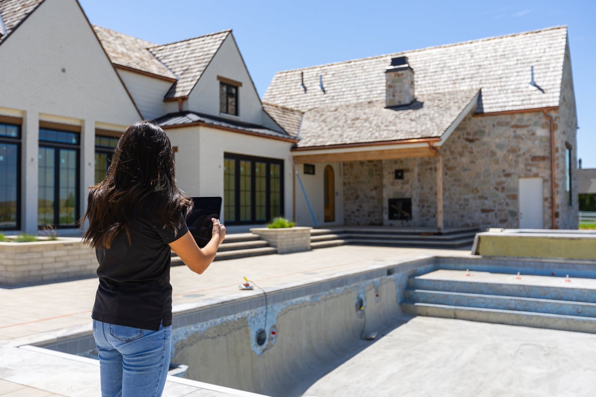 designer account manager inspection walkthrough backyard pool patio pavers 7
