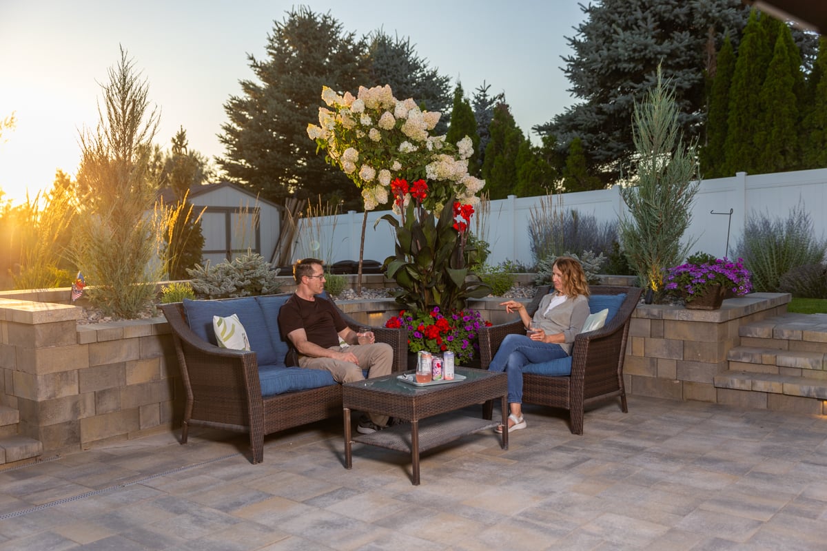 hardscape fire pit landscape lighting sitting wall paver patio furniture stone stairs customers family 6