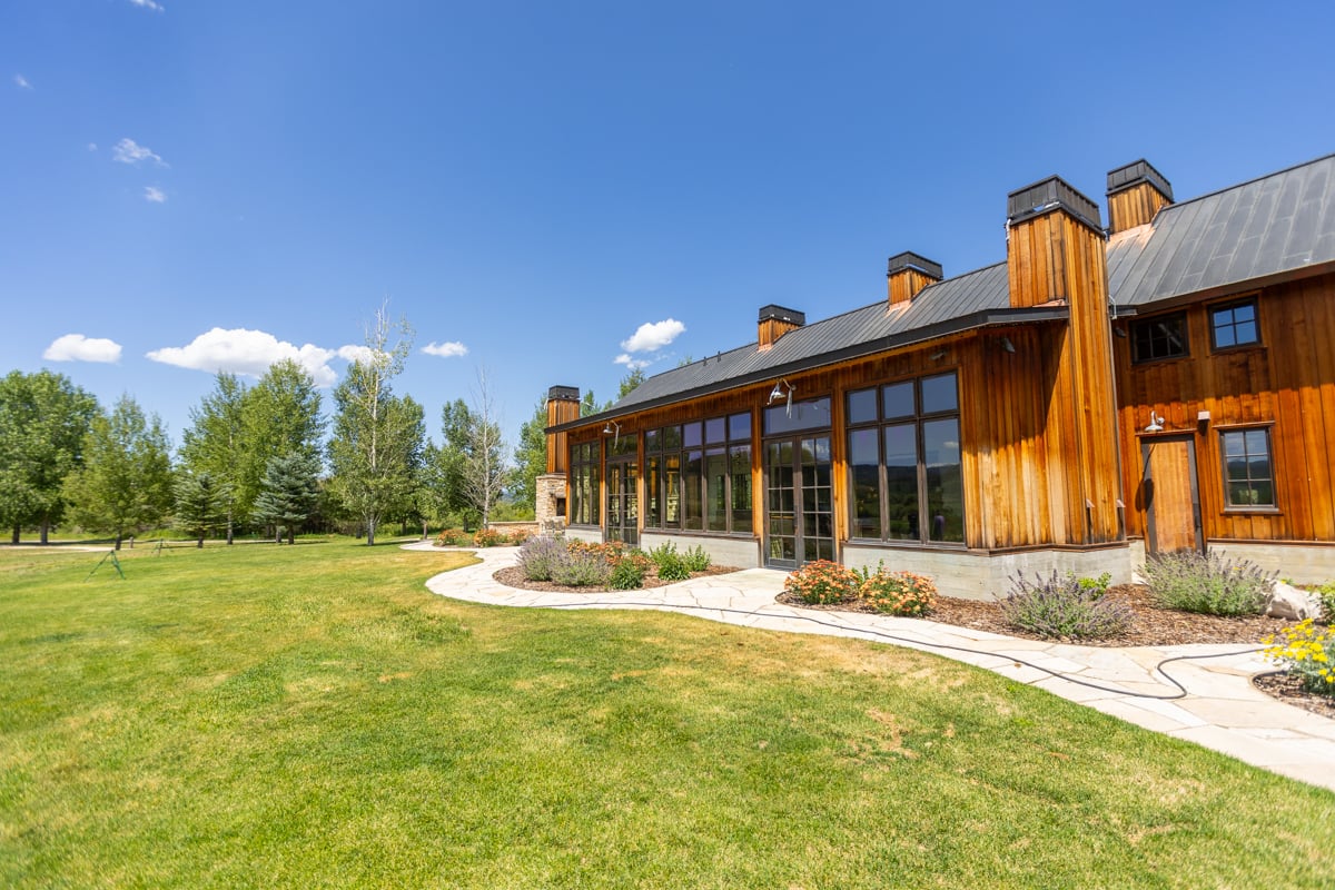nice house horizon planting bed walkway lawn trees