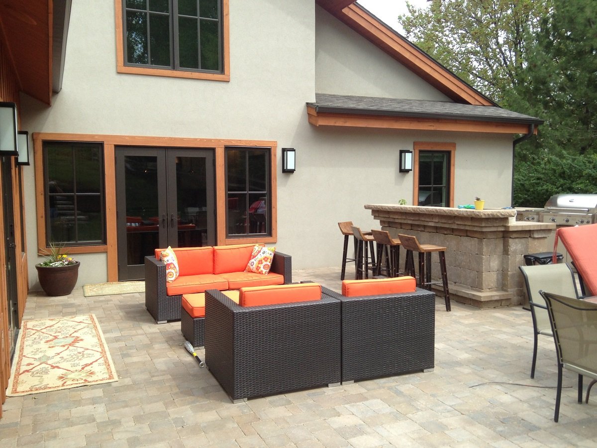 patio with outdoor kitchen and seating area