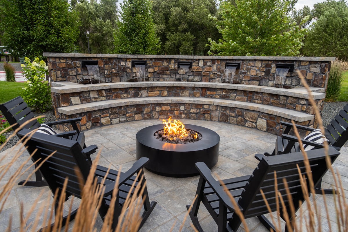 www.outbacklandscapeinc.comhubfschub_backupfirepit seating water feature waterfall chairs patio wall nice-2