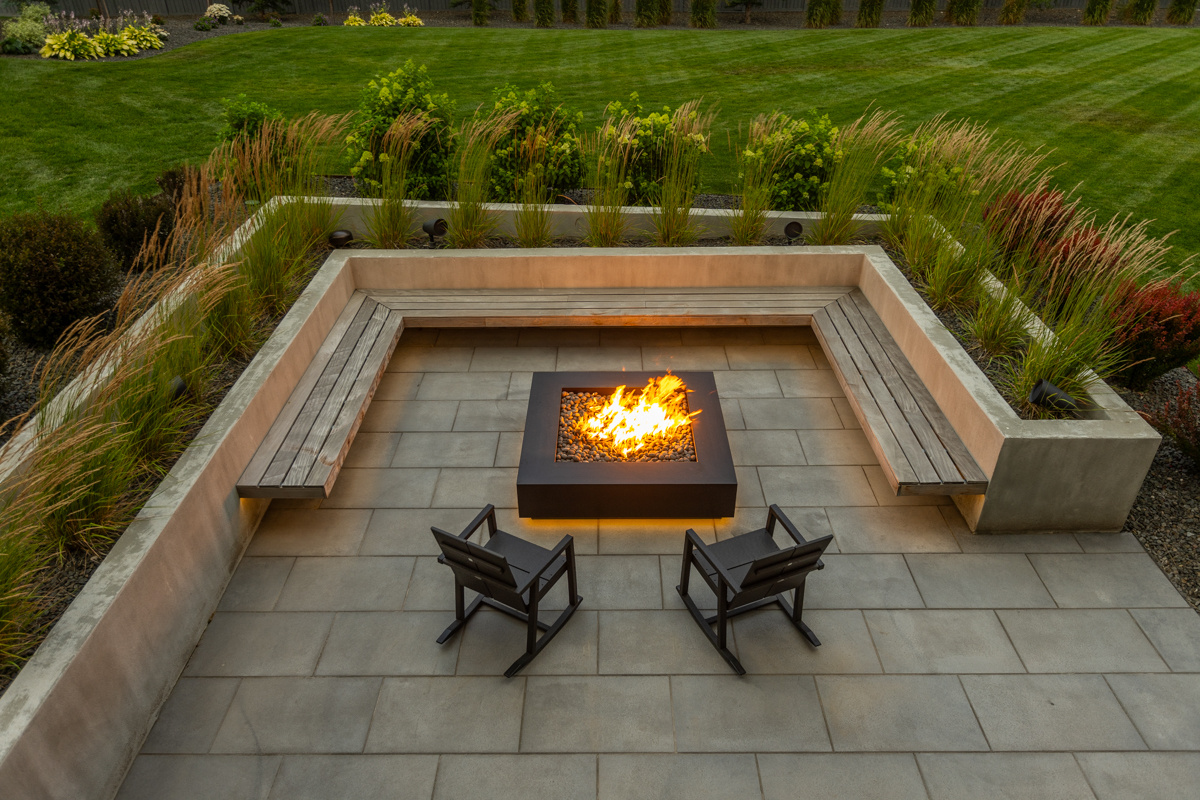 firepit seating bench raised planter plants patio grass green turf lawn yard