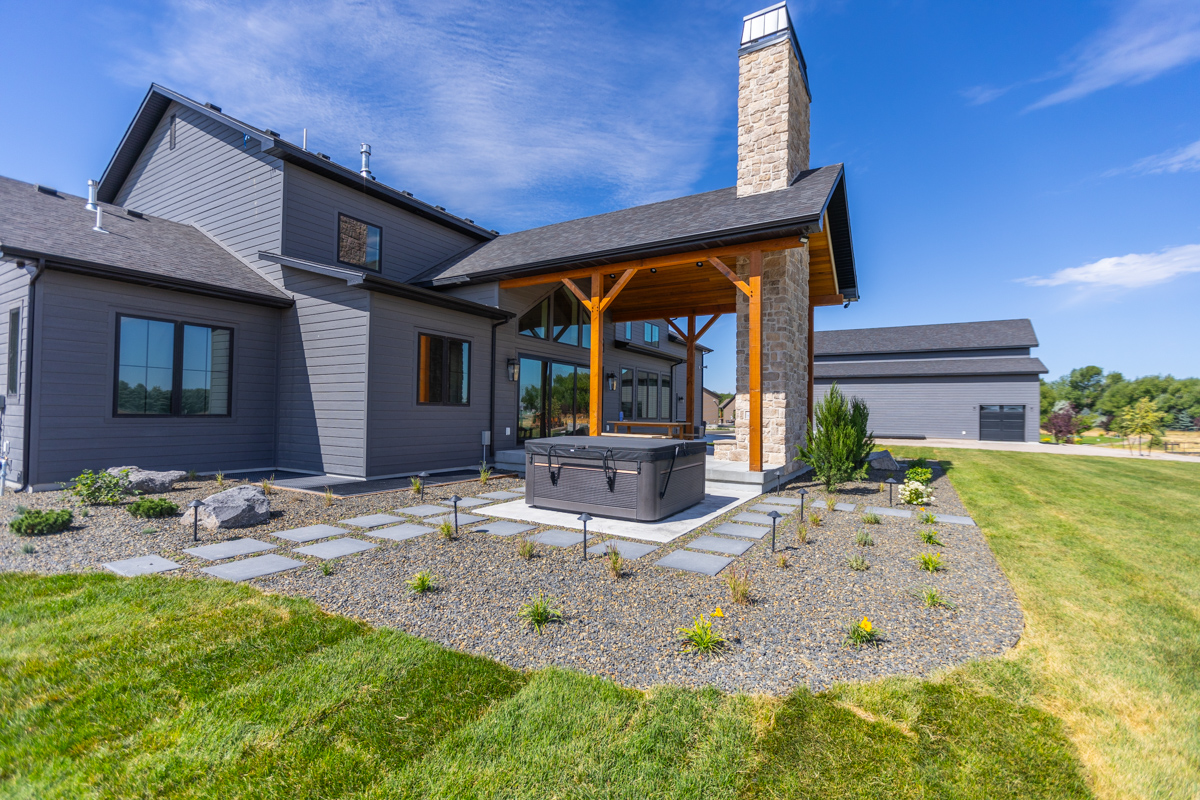 backyard lawn planting bed new plants pergola chimney hot tub stepper walkway