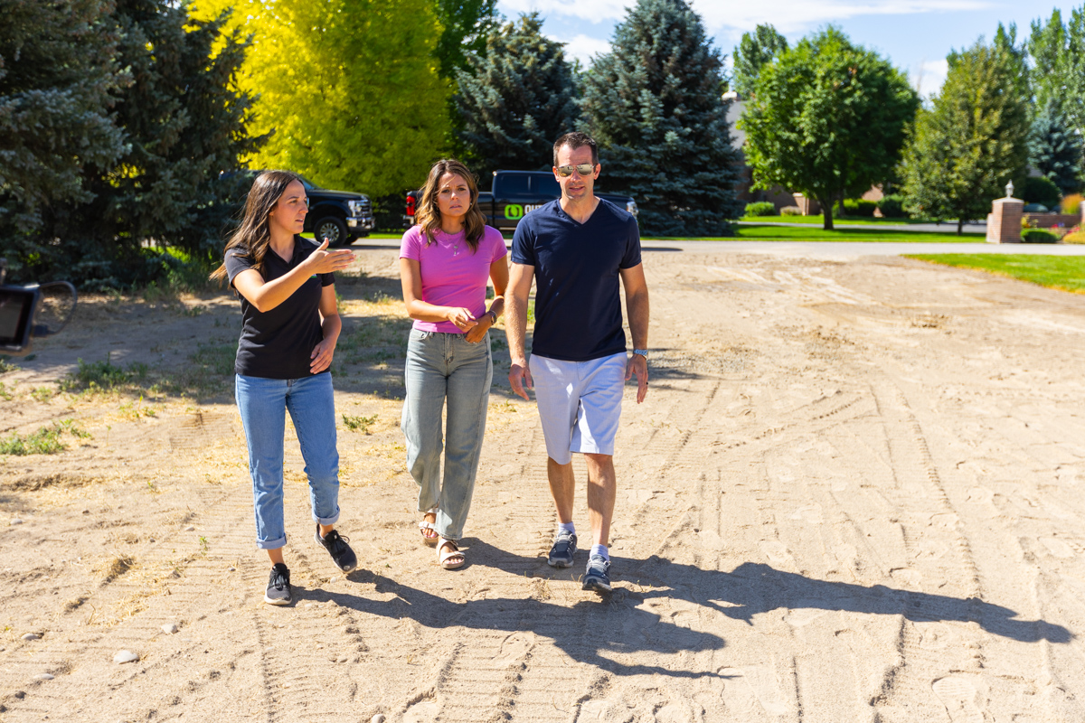 landscape designer and homeowners reviewing a landscaping project in idaho falls