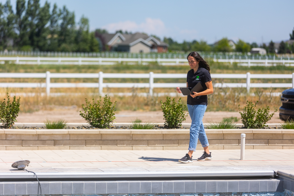 designer account manager inspection walkthrough backyard pool patio pavers 3