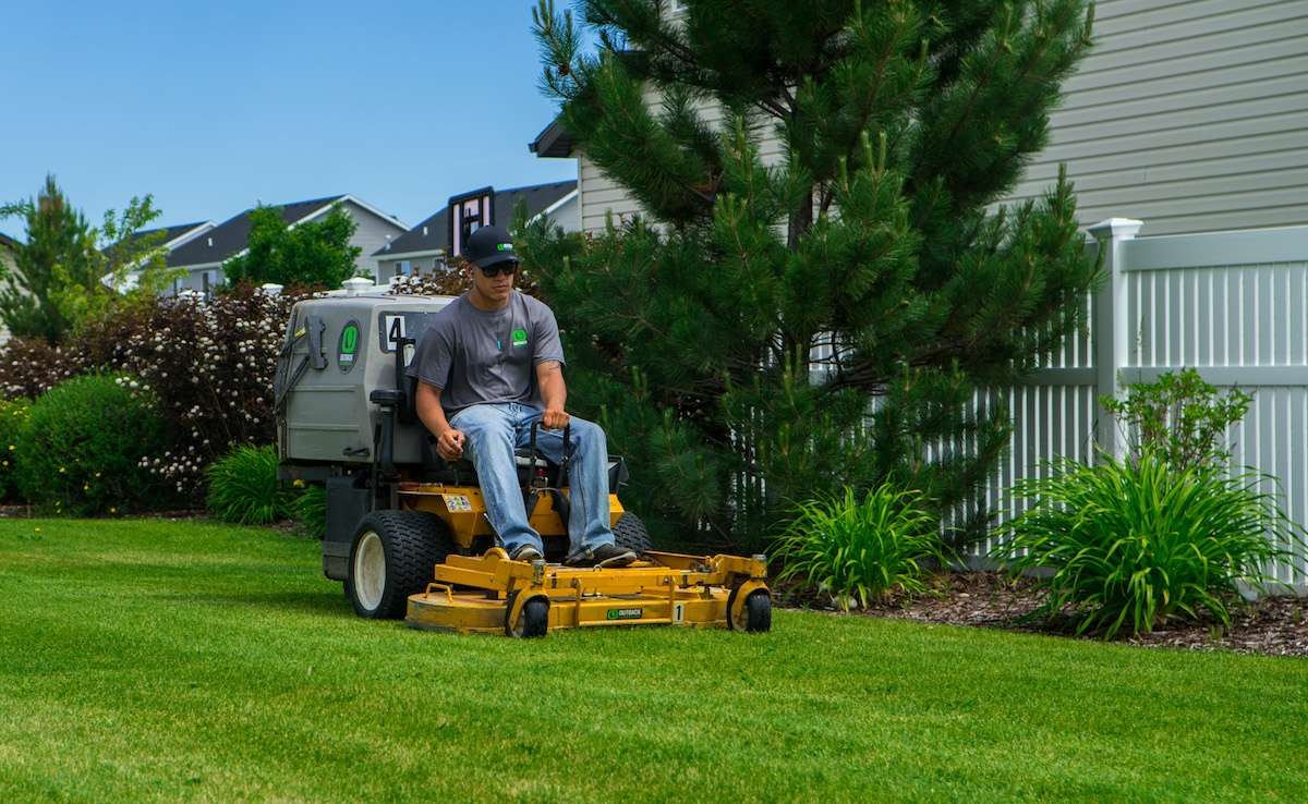 crew member lawn mowing