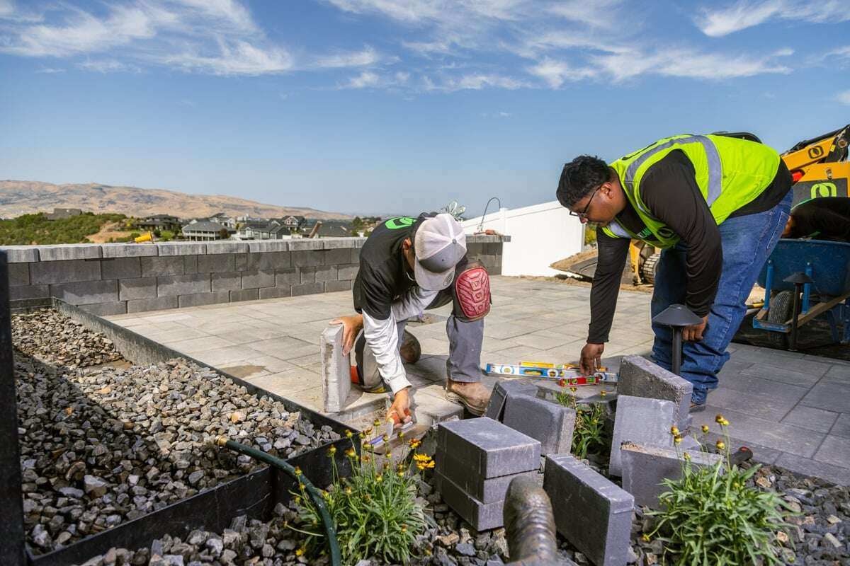 crew construction install paver action 10