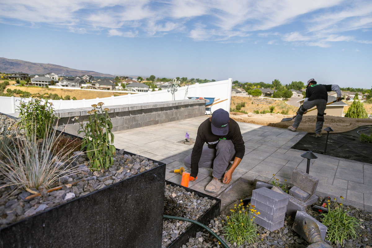 crew construction install paver action 4