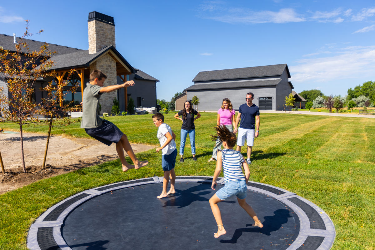customer account manager designer inspection meeting design build installation site walk kids playing 5