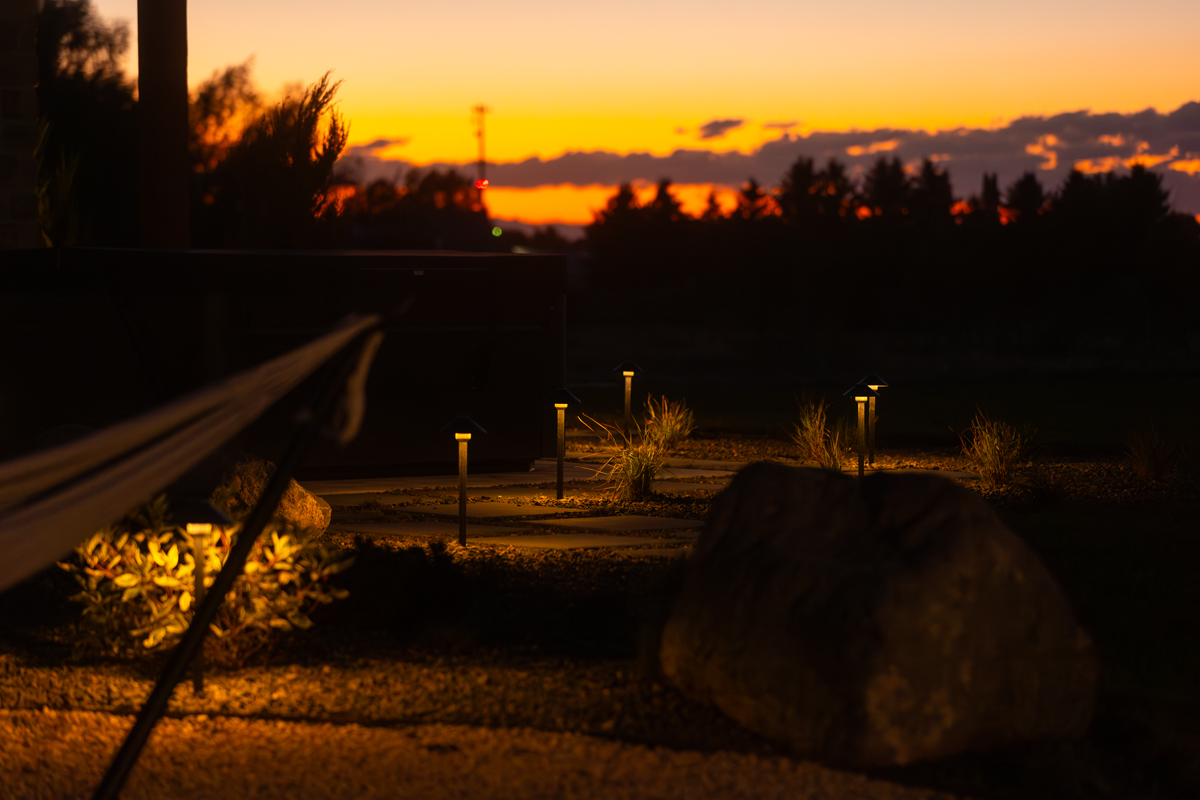 sunset stepper walkway landscape lighting boulder patio horizon