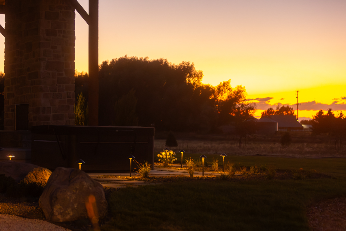 landscape lighting around a nice backyard in idaho falls