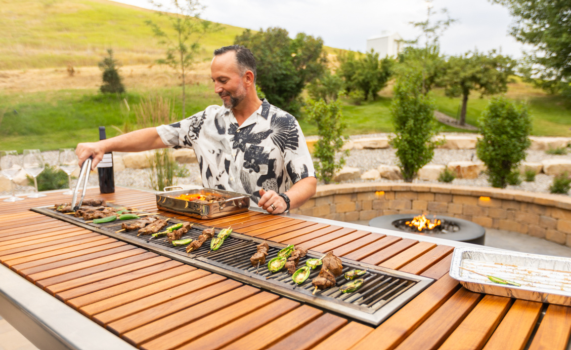 client grilling outdoors